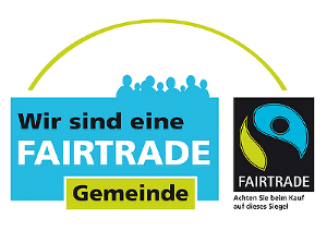 Das Bild zeigt des Schriftzug Fairtrade Gemeinde Steiermark auf blauem Hintergrund.